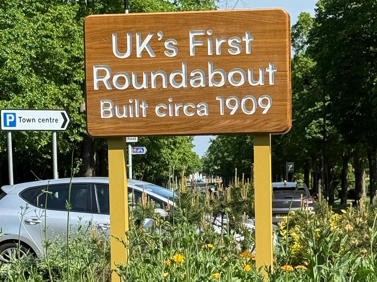 wooden engraved post sign