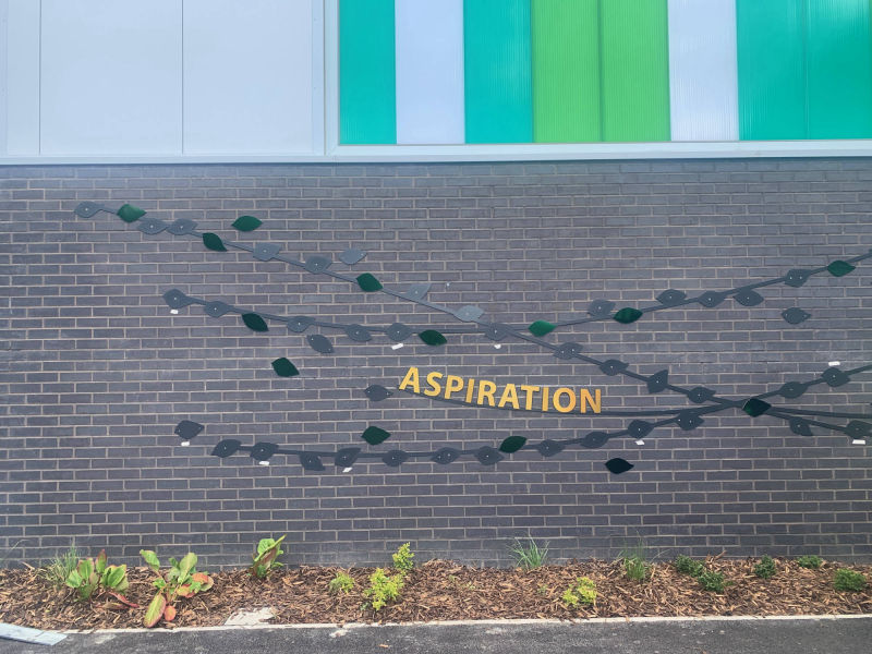 school laser cut art signage