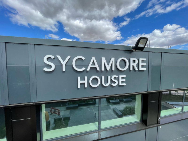 acyrlic unit signage 